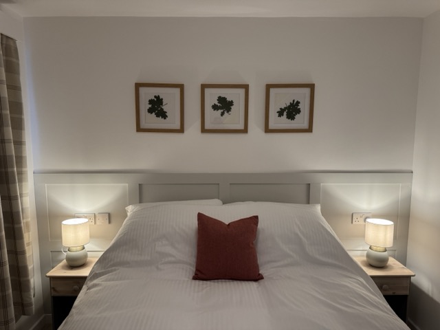 King-size bedroom at Oak Nook — your retreat near Hylands Estate